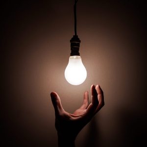 idea light bulb hand